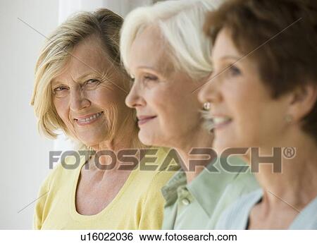Senior women in a row View Large Photo Image Stock Photograph - Senior women in a row. Fotosearch