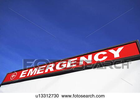 Stock Image - Sign directing to Emergency Room. Fotosearch
