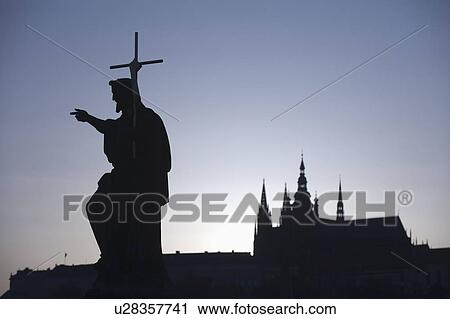 Silhouetted statue and cathedral View Large Photo Image Stock Image - Silhouetted statue and cathedral. Fotosearch