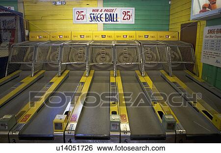 Stock Photograph - Skee-ball at amusement park. Fotosearch