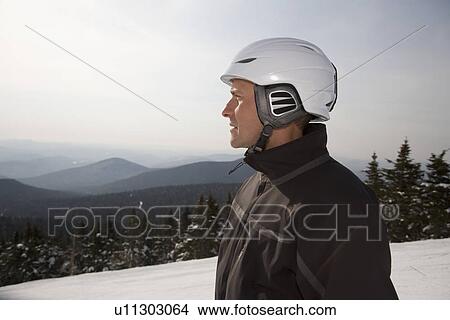 Snowboarder at top of ski hill View Large Photo Image Picture - Snowboarder at top of ski hill. Fotosearch