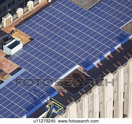 Stock Photography - solor panels on skyscraper. Fotosearch