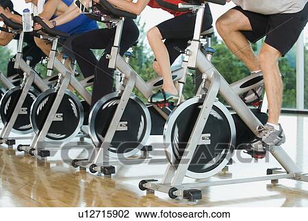 Stock Image - Spinning class. Fotosearch