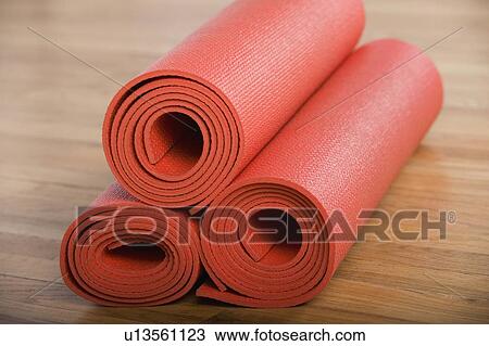 Stack of rolled yoga mats View Large Photo Image Stock Image - Stack of rolled yoga mats. Fotosearch