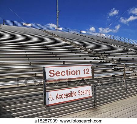 Stadium bleachers with wheelchair accessible seating View Large Photo Image Stock Photo - Stadium bleachers with wheelchair accessible seating. Fotosearch