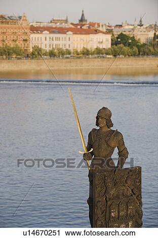 Statue in front of river and city View Large Photo Image Stock Image - Statue in front of river and city. Fotosearch