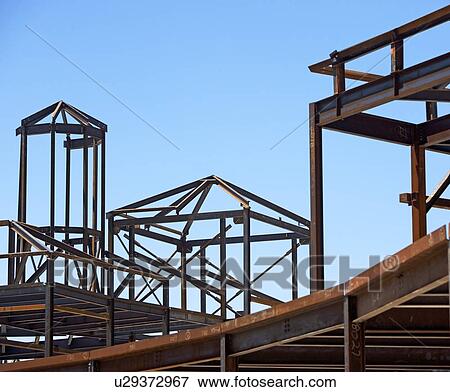 Stock Photo - Steel beam frames at construction site. Fotosearch
