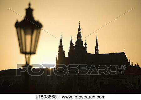 Sunset over silhouetted cathedral View Large Photo Image Stock Image - Sunset over silhouetted cathedral. Fotosearch
