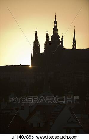 Stock Photography - Sunset over silhouetted cathedral. Fotosearch