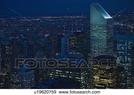 Stock Photo - Sunset view of midtown Manhattan. Fotosearch