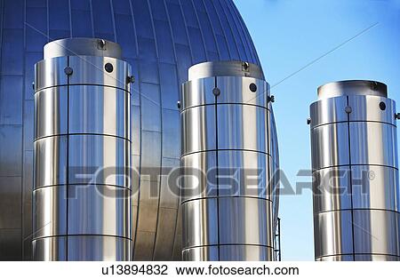 Stock Image - Tanks at water treatment plant. Fotosearch