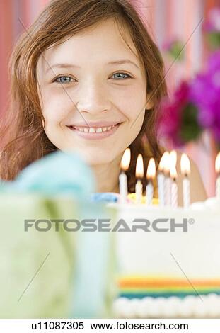 Teenage girl celebrating birthday View Large Photo Image Stock Photography - Teenage girl celebrating birthday. Fotosearch