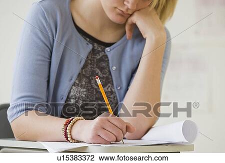 Teenaged girl doing homework View Large Photo Image Stock Image - Teenaged girl doing homework. Fotosearch