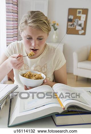 Teenaged girl doing homework View Large Photo Image Stock Image - Teenaged girl doing homework. Fotosearch