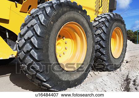 tires on heavy construction equipment View Large Photo Image Stock Photo - tires on heavy construction equipment. Fotosearch