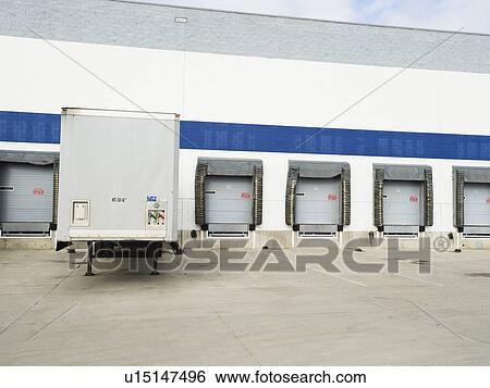 Stock Photograph - Truck parked at loading dock. Fotosearch