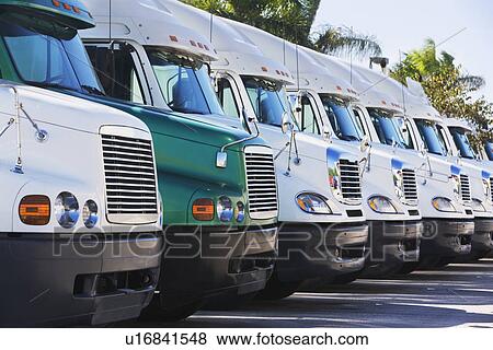 Stock Photo - trucks in a row. Fotosearch
