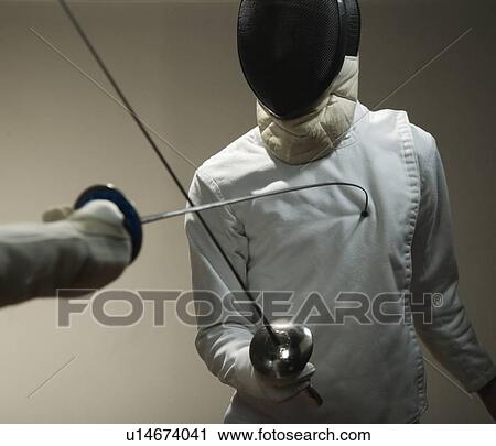 Two men fencing View Large Photo Image Stock Image - Two men fencing. Fotosearch