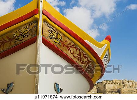 Picture - Vibrant Luzzu fishing boat, Malta. Fotosearch