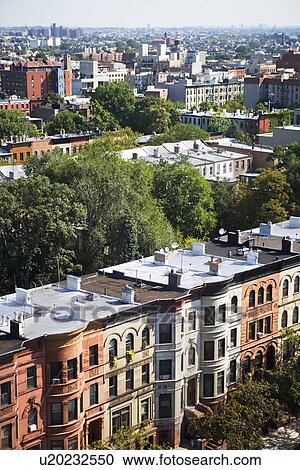 Stock Image - View of rowhouses in Brooklyn, New York. Fotosearch