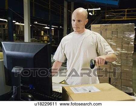 Warehouse worker scanning package View Large Photo Image Stock Image - Warehouse worker scanning package. Fotosearch
