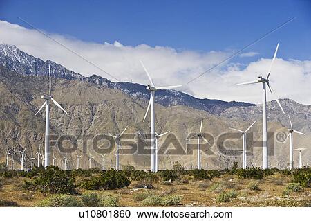 Stock Image - Wind farm in front of mountains, Palm Springs, California, United States. Fotosearch
