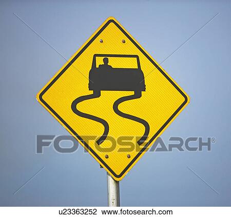 Stock Image - winding road sign. Fotosearch