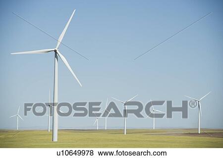 Stock Photo - Windmills on wind farm. Fotosearch