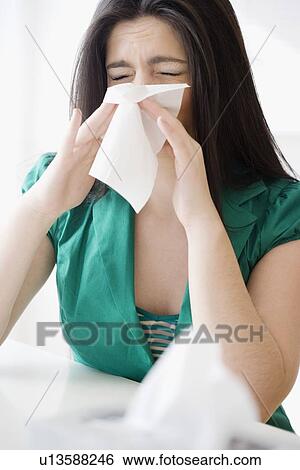 Woman blowing nose View Large Photo Image Stock Photograph - Woman blowing nose. Fotosearch