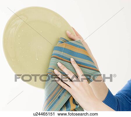 Woman drying dish View Large Photo Image Stock Image - Woman drying dish. Fotosearch