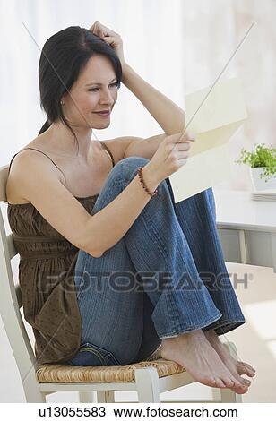 Woman reading letter View Large Photo Image Stock Image - Woman reading letter. Fotosearch