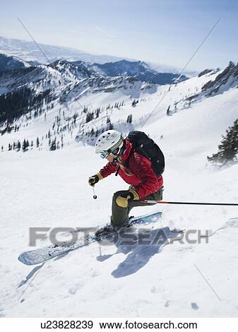 Woman skiing downhill View Large Photo Image Stock Photo - Woman skiing downhill. Fotosearch