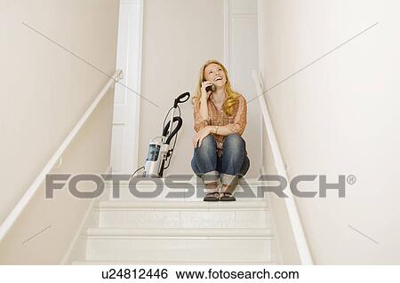 Woman talking on cell phone View Large Photo Image Stock Photograph - Woman talking on cell phone. Fotosearch
