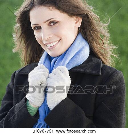 Woman wearing scarf and gloves View Large Photo Image Stock Image - Woman wearing scarf and gloves. Fotosearch