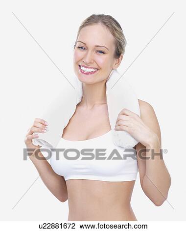 Stock Image - Woman with towel around neck. Fotosearch