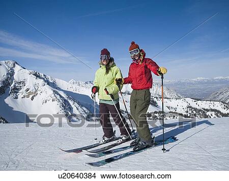 Women standing on skis, Wasatch Mountains, Utah, United States View Large Photo Image Picture - Women standing on skis, Wasatch Mountains, Utah, United States. Fotosearch