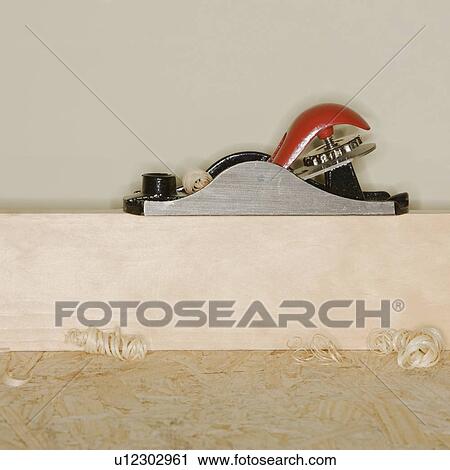 Woodworking plane on block of wood View Large Photo Image Stock Image - Woodworking plane on block of wood. Fotosearch