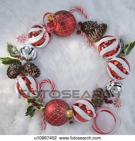 Wreath of Christmas ornaments in snow View Large Photo Image Stock Image - Wreath of Christmas ornaments in snow. Fotosearch