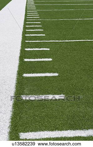 Yard line markers on football field View Large Photo Image Stock Photo - Yard line markers on football field. Fotosearch