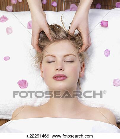 Young woman getting massage View Large Photo Image Stock Photography - Young woman getting massage. Fotosearch