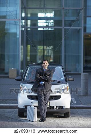 Businessman Beside Smart Car View Large Photo Image Stock Image - Businessman Beside Smart Car. Fotosearch