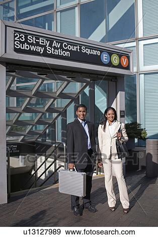 Businesswoman and Businessman at Subway Station View Large Photo Image Stock Photo - Businesswoman and Businessman at Subway Station. Fotosearch