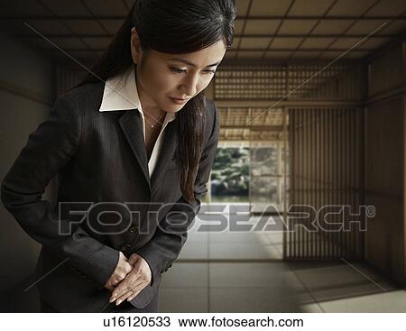Businesswoman Bowing View Large Photo Image Stock Image - Businesswoman Bowing. Fotosearch