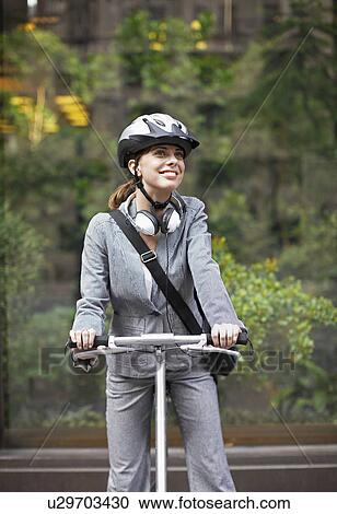 Businesswoman Cycling View Large Photo Image Stock Image - Businesswoman Cycling. Fotosearch