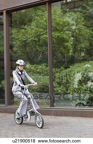 Businesswoman Cycling View Large Photo Image Stock Photo - Businesswoman Cycling. Fotosearch