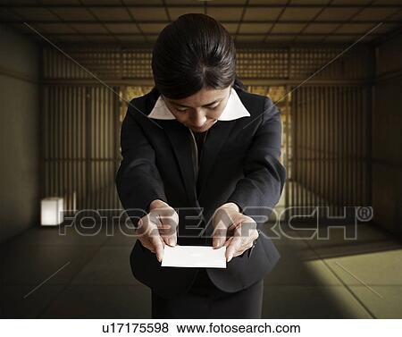 Businesswoman Giving Business Card View Large Photo Image Stock Photo - Businesswoman Giving Business Card. Fotosearch