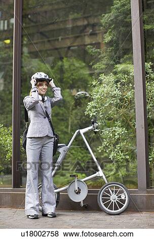 Businesswoman with Folding Bike View Large Photo Image Stock Photo - Businesswoman with Folding Bike. Fotosearch