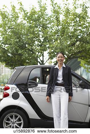 Happy Woman by Smart Car View Large Photo Image Stock Photograph - Happy Woman by Smart Car. Fotosearch