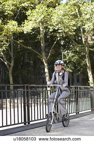 Mid-Adult Businesswoman Cycling View Large Photo Image Stock Image - Mid-Adult Businesswoman Cycling. Fotosearch