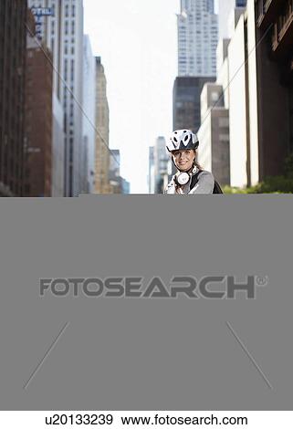 Mid-Adult Businesswoman with Bicycle View Large Photo Image Stock Photo - Mid-Adult Businesswoman with Bicycle. Fotosearch